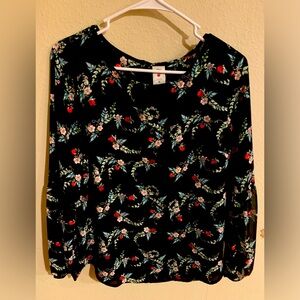 100% Polyester Blouse with Red appliqués on Blouse.